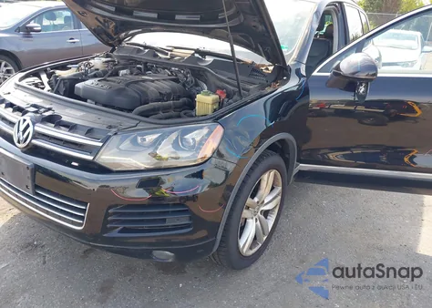 2012 Volkswagen Touareg Vr6 Executive z USA, uszkodzony, nr VIN WVGEF9BP1CD007793